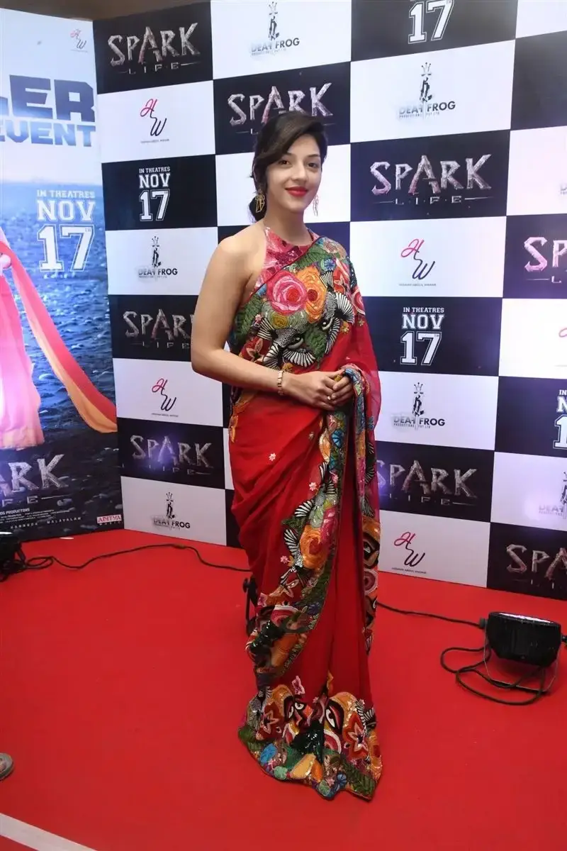 Mehreen Pirzada Red Saree at Spark LIFE Movie Trailer Launch